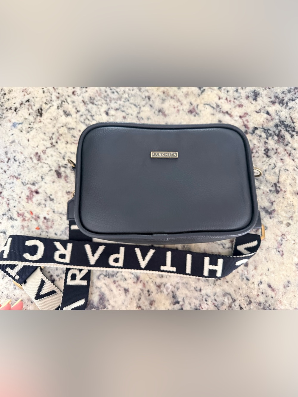 Parchita women’s Black Crossbody Bag with Branded Strap